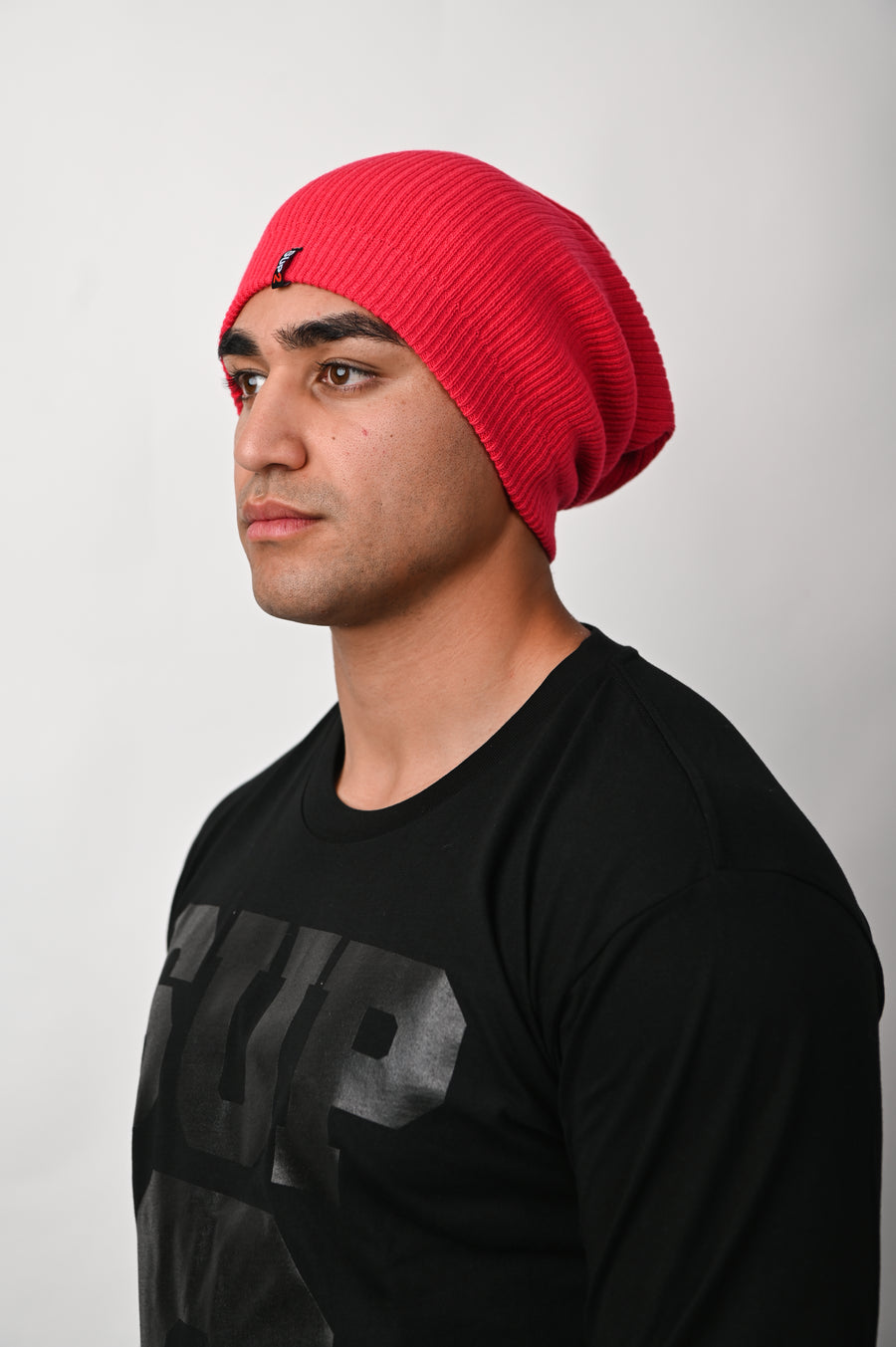 SUP2 Famous long rib beanie, stylish headwear with a cozy knit design, ideal for cold weather and casual outfits.